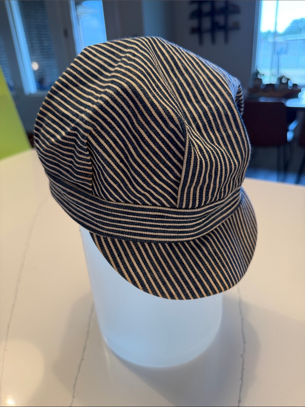 Vintage hickory stripe train engineer child’s cap, known as a railroad conductor